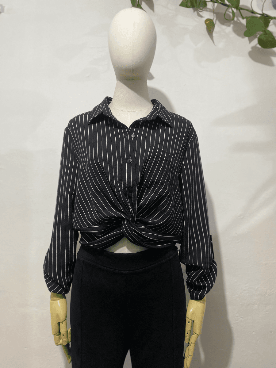 Blusa rayada · Negro
