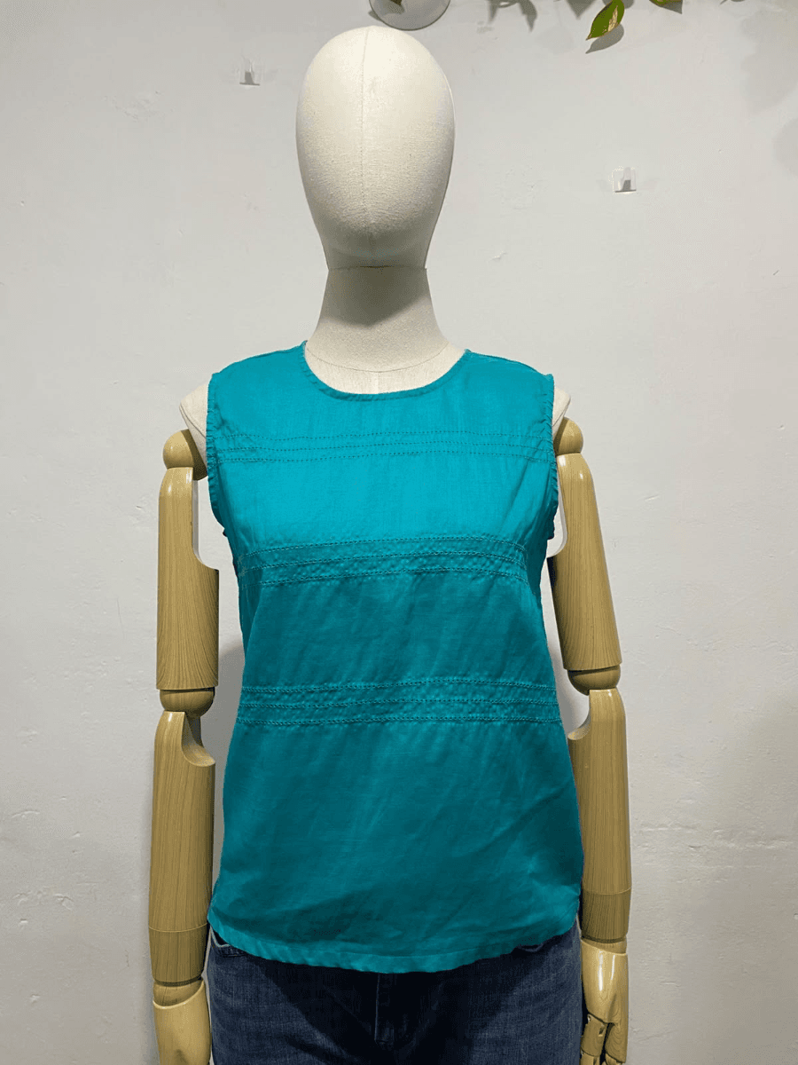 Blusa sin mangas verde esmeralda