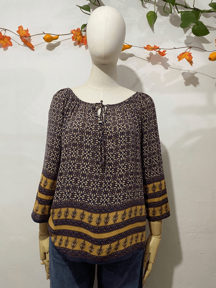 Blusa estampado geométrico